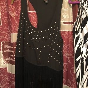 Brand new BeBe top with fringe